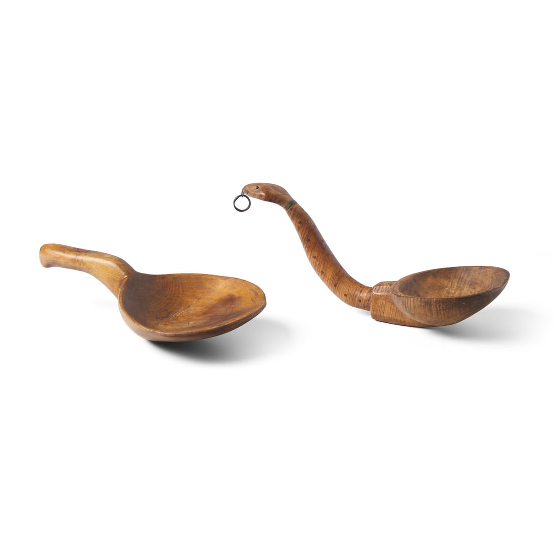 Two Carved and Figured Maple Scoops: Two Carved and Figured Maple Scoops Northeastern Woodlands, 19th Century the first, with handle in the form of a snake, with copper studded eyes and ring to neck, inlaid with diamonds to head and hand