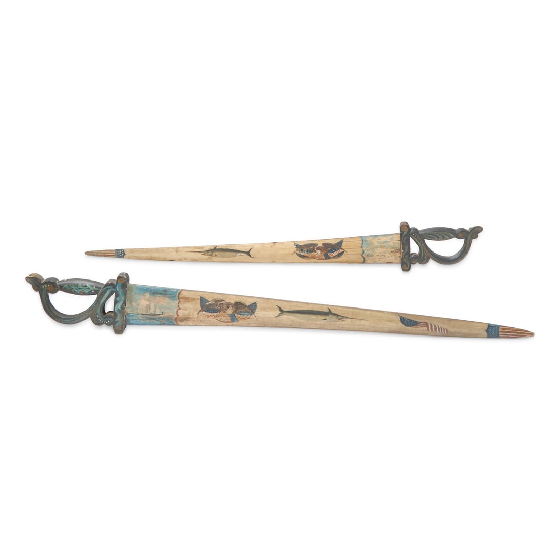 Two Sailor Carved and Painted Swordfish Bill and Wood Swords: Two Sailor Carved and Painted Swordfish Bill and Wood Swords Circa 1920 decorated with ships, emblazoned eagles, swordfish, and American flags and Patriotic shields. Length 41 1/2 inches (longest). Th