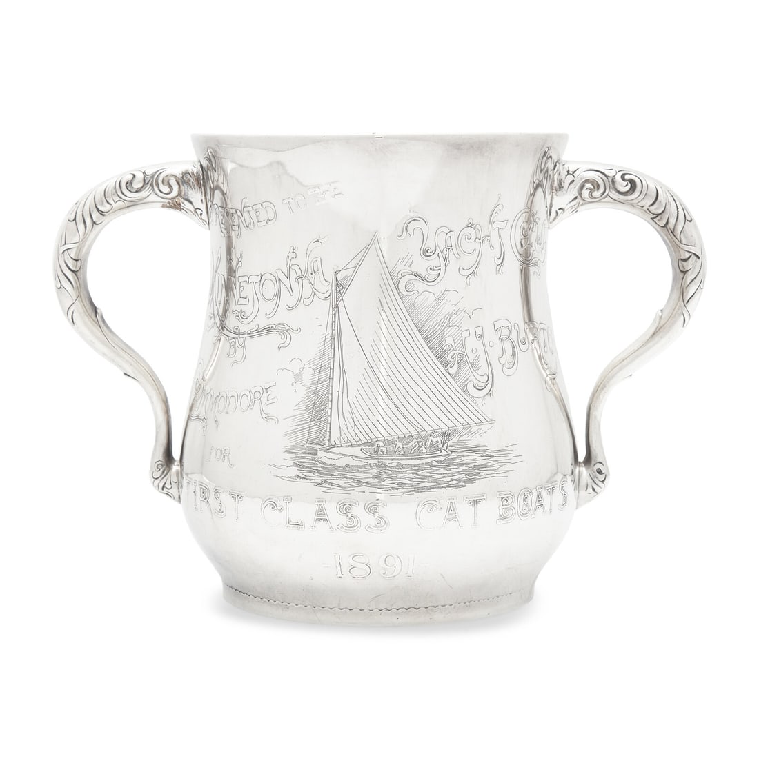 An Aesthetic Movement Sterling Silver Two-Handled Yacht Racing Trophy: An Aesthetic Movement Sterling Silver Two-Handled Yacht Racing Trophy Frank Whiting & Co., North Attleboro, Massachusetts, Dated, "1891" inscribed, "Presented To The Minnetonka Yacht Club/ By