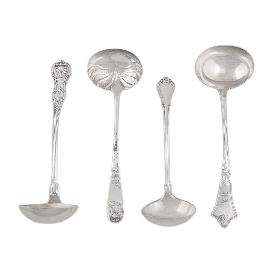 Four Sterling Silver Punch or Soup Lades: Four Sterling Silver Punch or Soup Lades Various Makers, Late 19th Century the first by Towle Silversmiths, Newburyport, Massachusetts, engraved with floral motifs to handle, marked to underside; the
