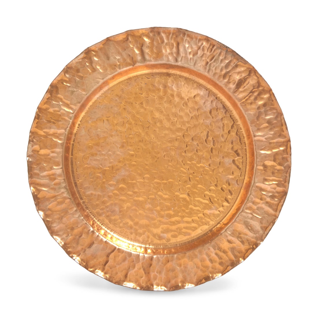 An Arts & Crafts Hammered Copper Plate: An Arts & Crafts Hammered Copper Plate W.H. Dunstan (active 1900-1930), Circa 1920 the underside stamped, "Solid Copper/ Made by W.H. Dunstan". Height 3/4 x diameter 11 1/2 inches. This lot is
