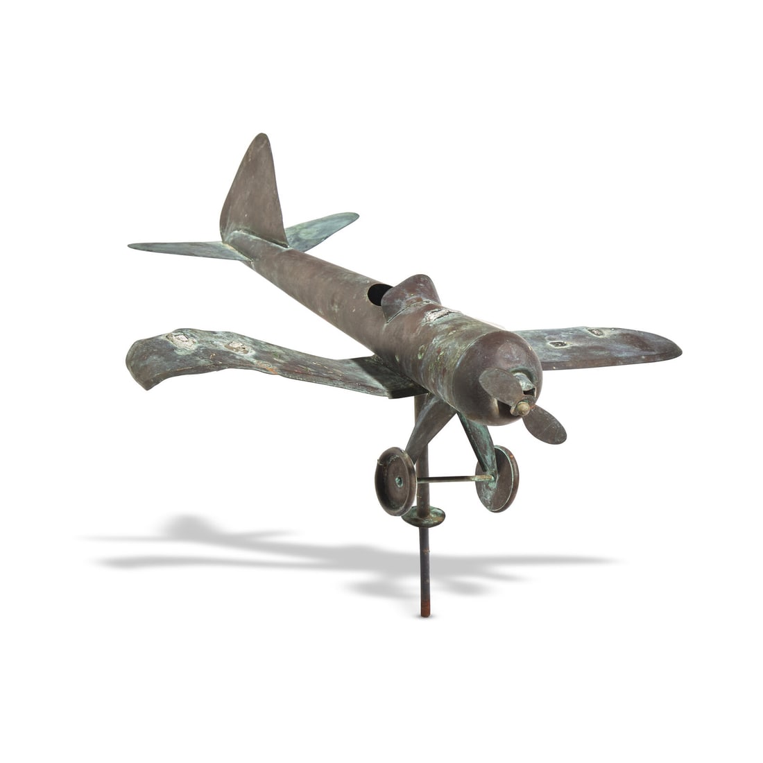 A Patinated Copper Airplane Weathervane: A Patinated Copper Airplane Weathervane 20th Century Height 13 1/2 x width 22 1/2 x depth 21 inches (approx., overall). This lot is located in Philadelphia.