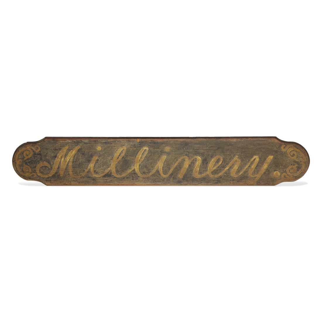 A Painted Wood "Millinery" Trade Sign