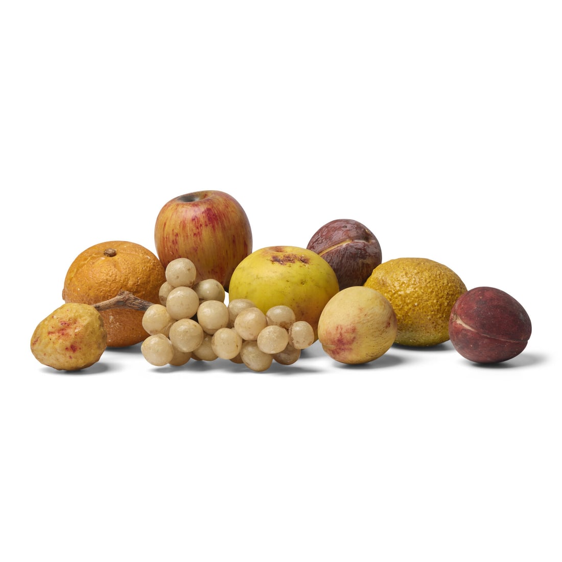 A Group of Nine Pieces of Painted Stone Fruit: A Group of Nine Pieces of Painted Stone Fruit Late 19th Century comprising two apples, a lemon, an orange, three plums, a strawberry, and a grape cluster. Diameter 3 inches (green apple). Estate of Vi