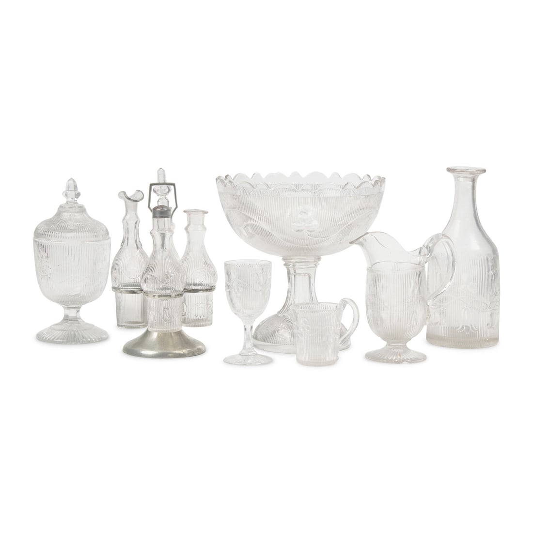 A Group of Seven Pressed Flint Glass Tablewares in the "Bellflower" Pattern (1 of 4)
