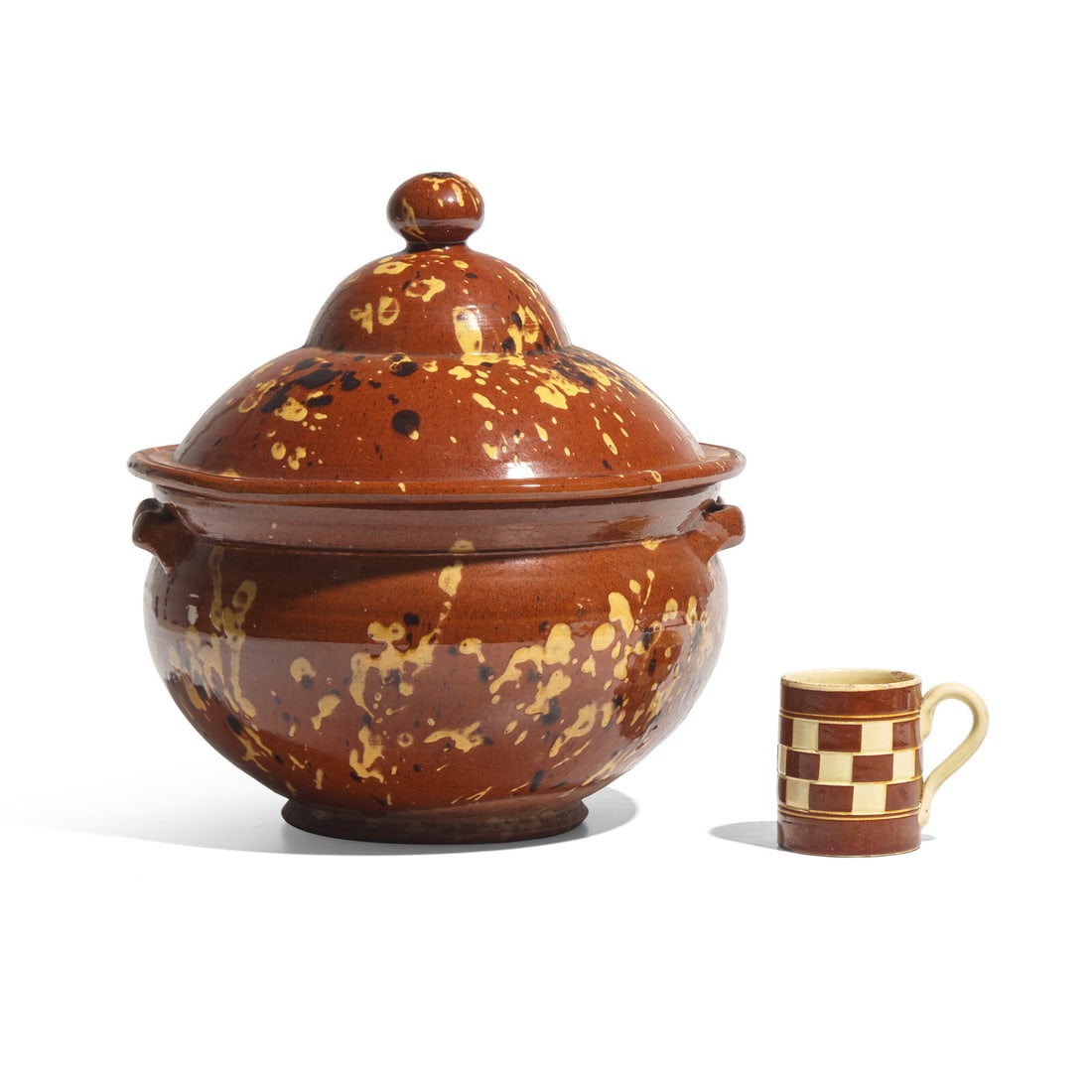 A Glazed and Slip-Decorated Redware Covered Tureen and a Checkered Yellowware Mug (1 of 2)
