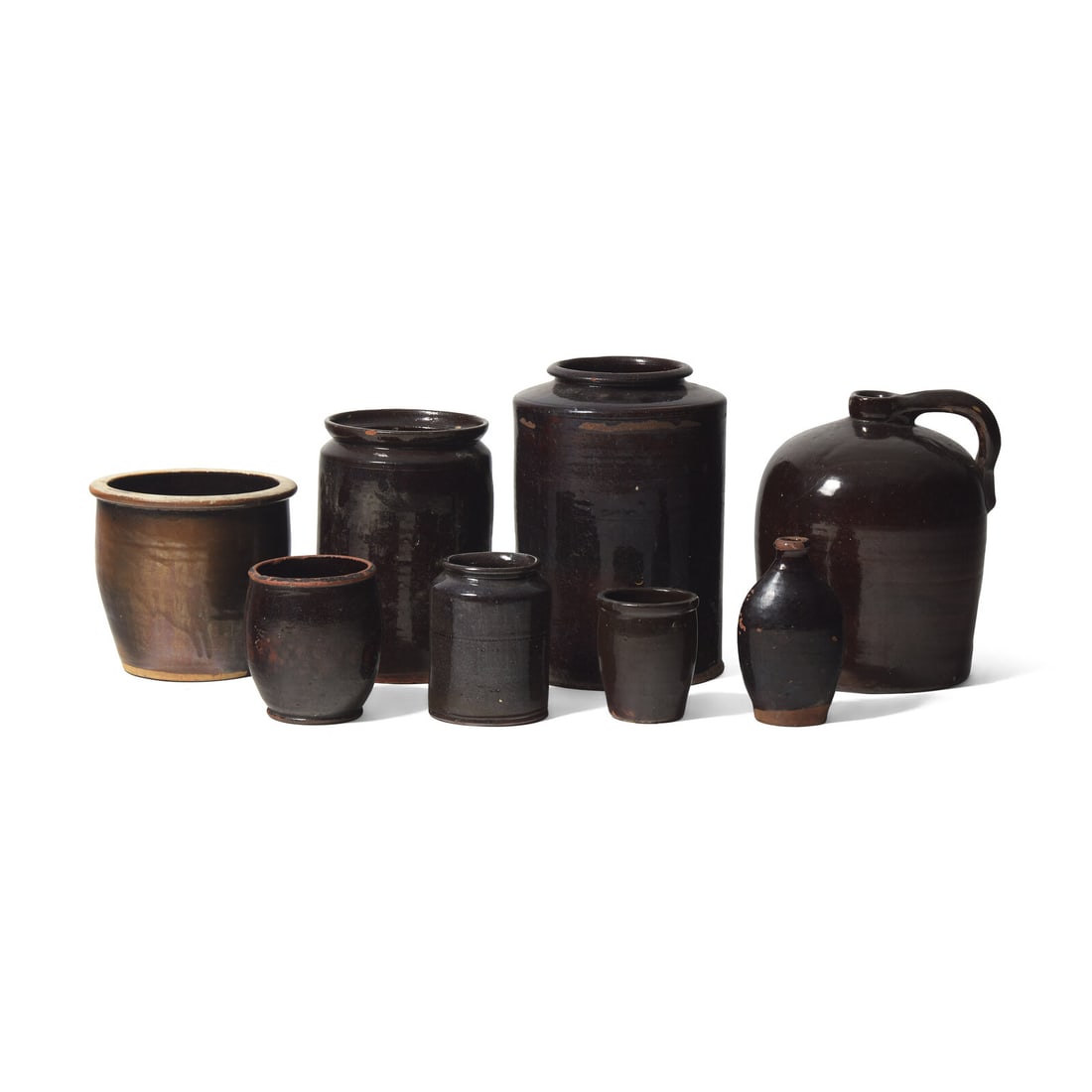 A Group of Eight Albany Glazed Redware Items (1 of 2)