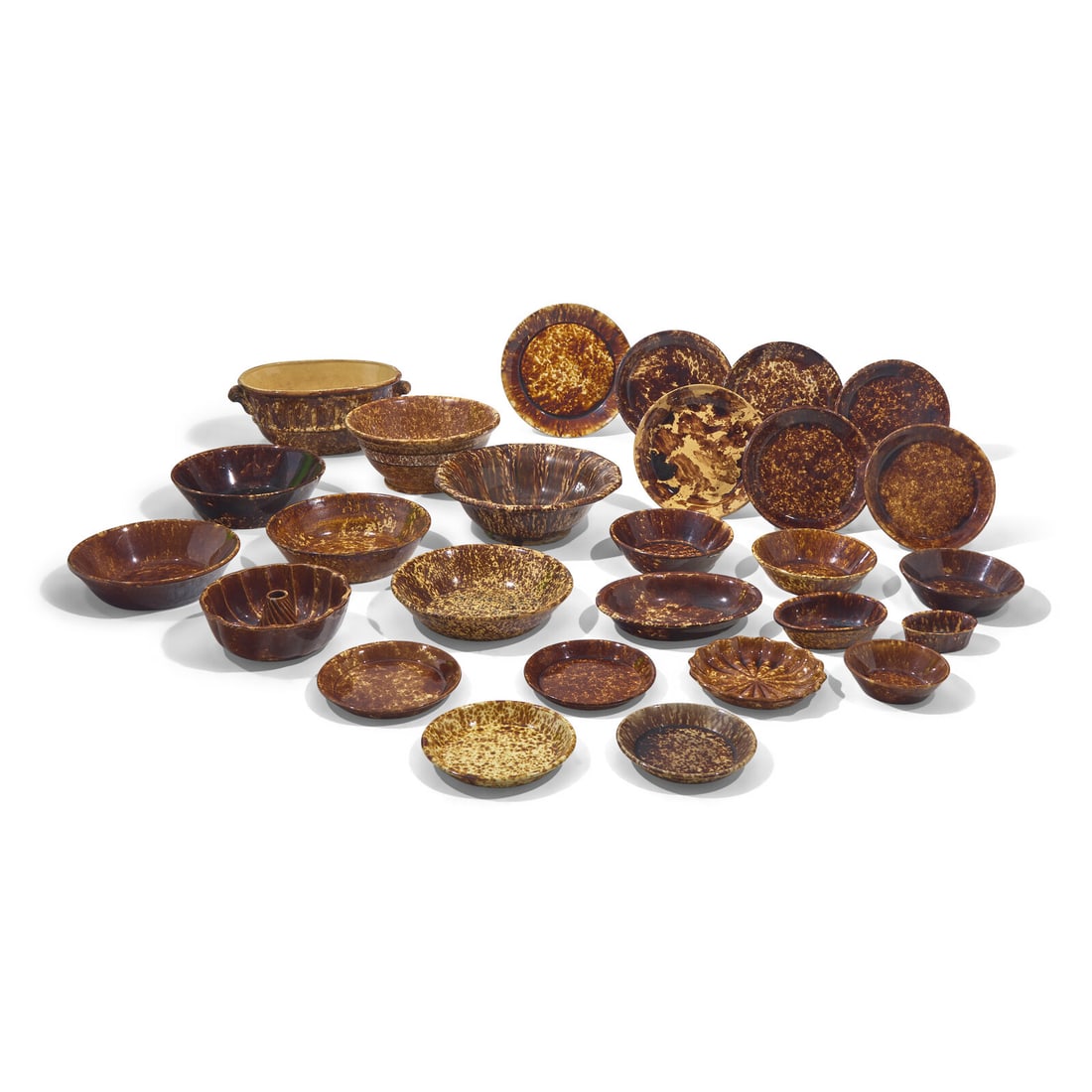 A Large Group of Twenty-Seven Bennington or Rockingham Glazed Earthenware Items (1 of 3)