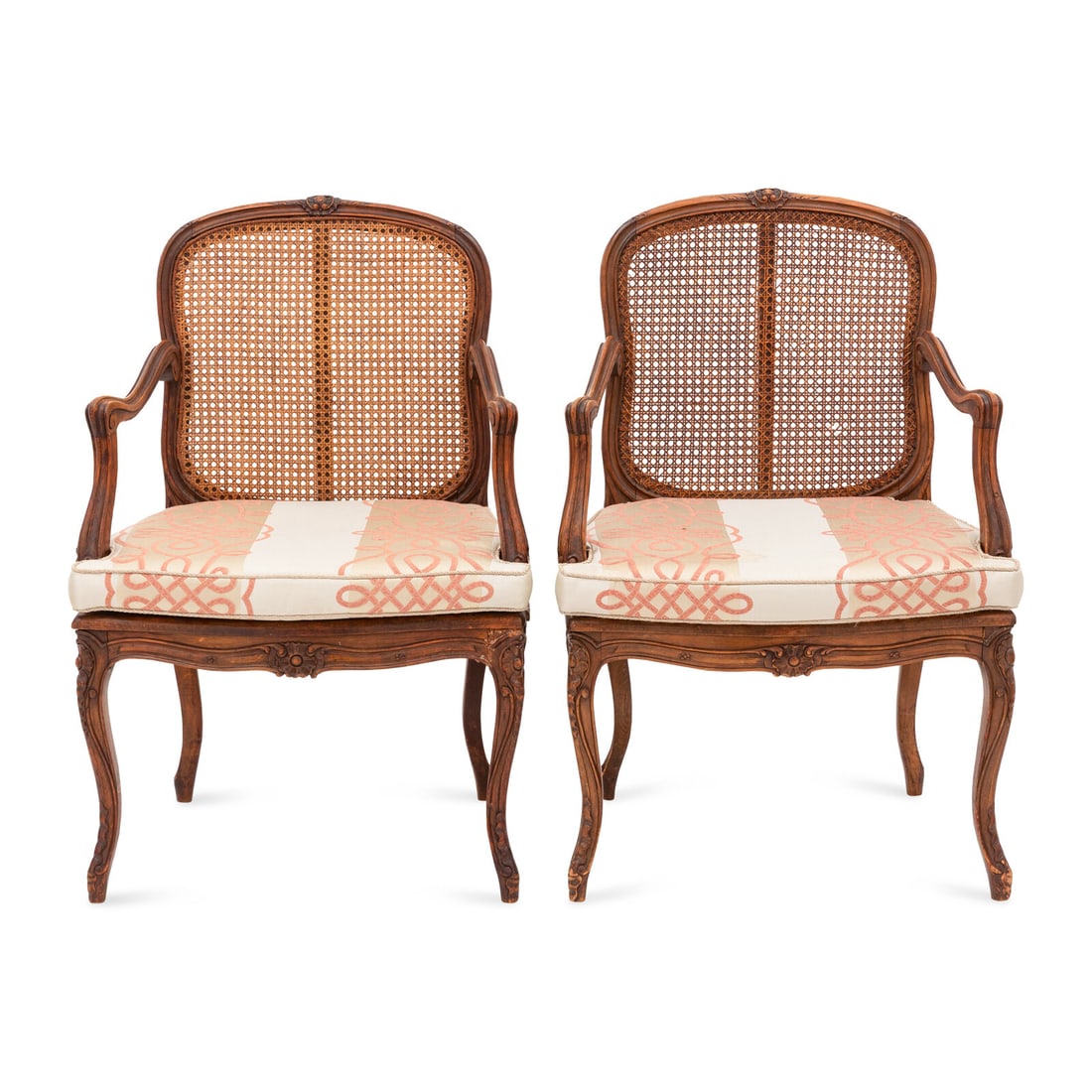A Pair of Louis XV Style Cane Upholstered Fauteuils: A Pair of Louis XV Style Cane Upholstered Fauteuils Second Half 19th Century Height 38 1/4 x width 25 x depth 21 inches. This lot is located in Chicago.