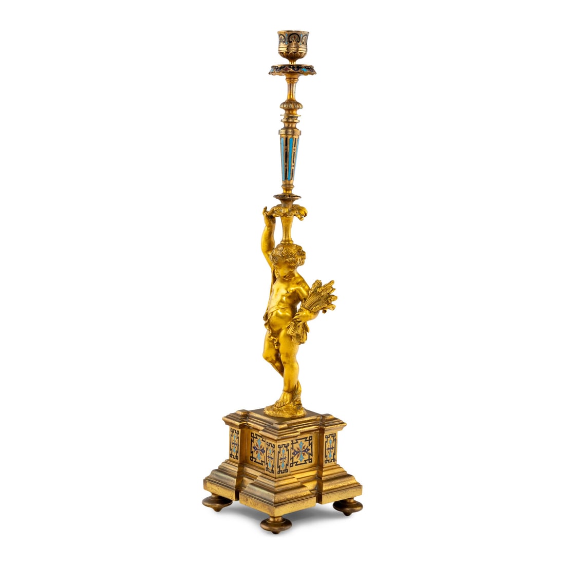 A French Gilt Bronze and Champlevé Figural Candlestick: A French Gilt Bronze and Champlevé Figural Candlestick Late 19th Century Height 18 x width 4 1/2 inches. This lot is located in Chicago. Provenance: Bonhams, Los Angeles, The Elegant Home, Novemb