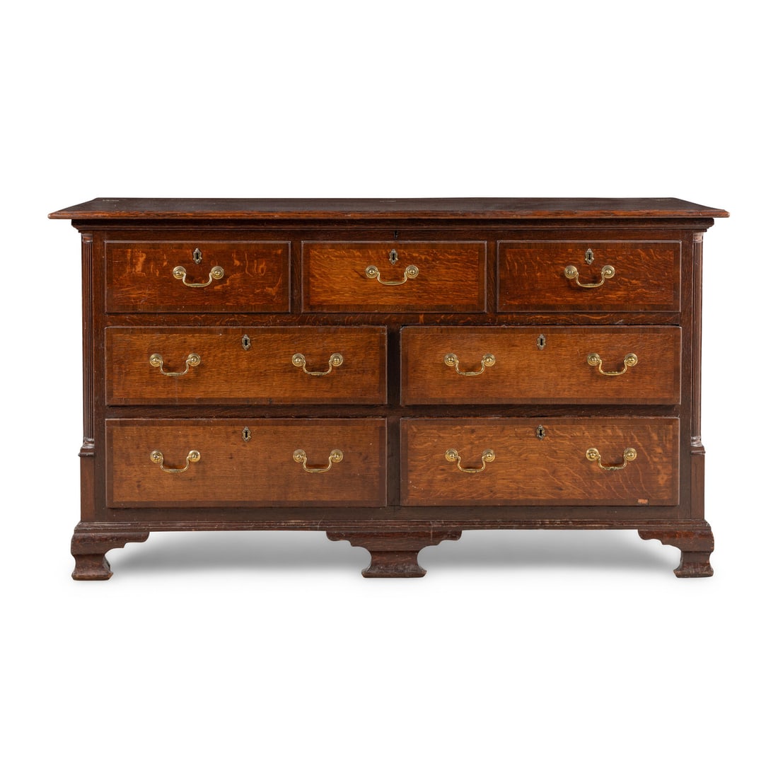 An English Oak Mule Chest: An English Oak Mule Chest Early 20th Century Height 38 x width 68 x depth 22 inches. This lot is located in Chicago.