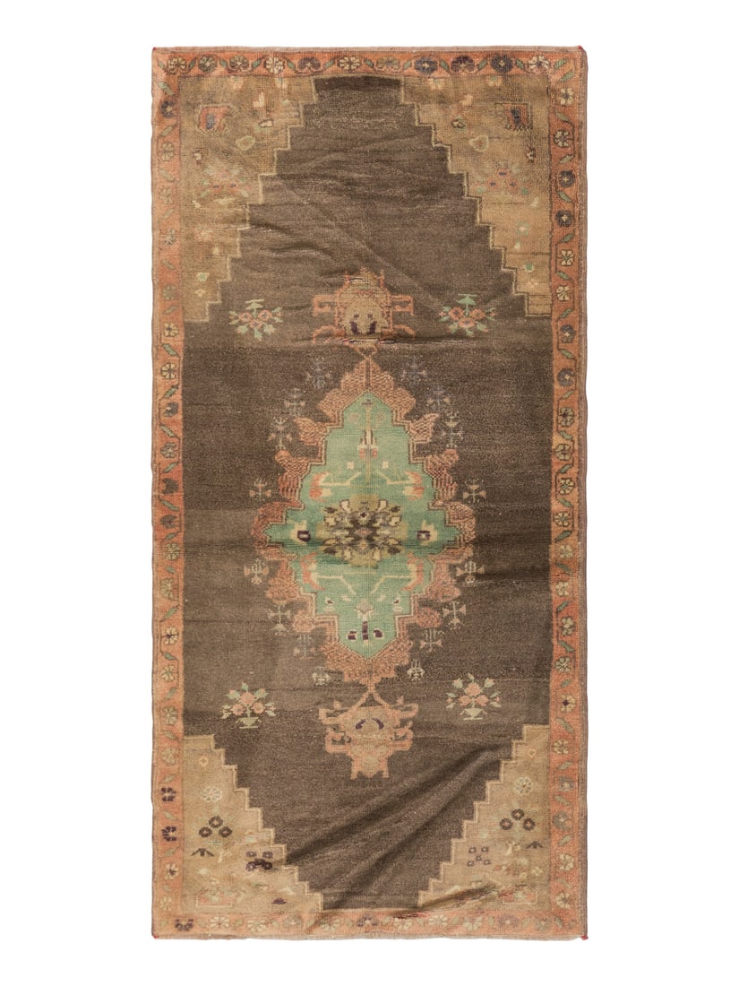 An Oushak Rug: An Oushak Rug 6 feet 8 inches x 3 feet 3 inches. Property from a Private Family Trust This lot is located in Chicago.