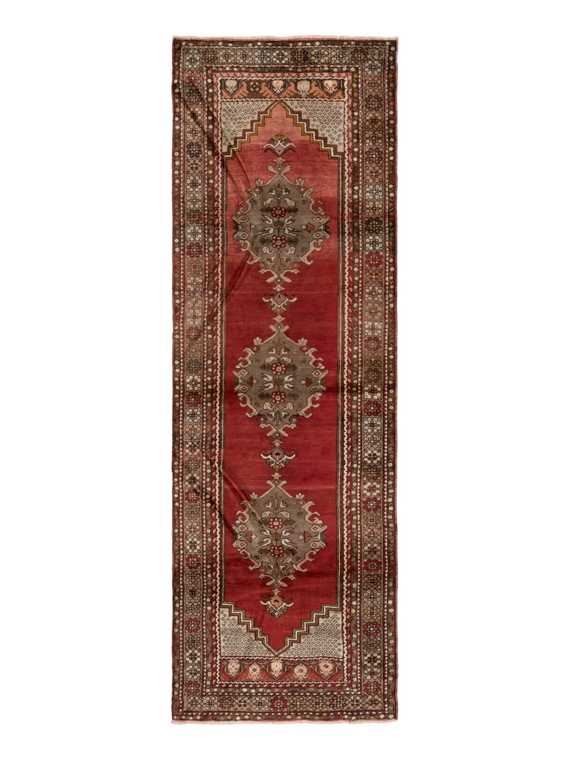 An Oushak Runner: An Oushak Runner 10 feet 8 inches x 3 feet 7 inches. Property from a Private Family Trust This lot is located in Chicago.