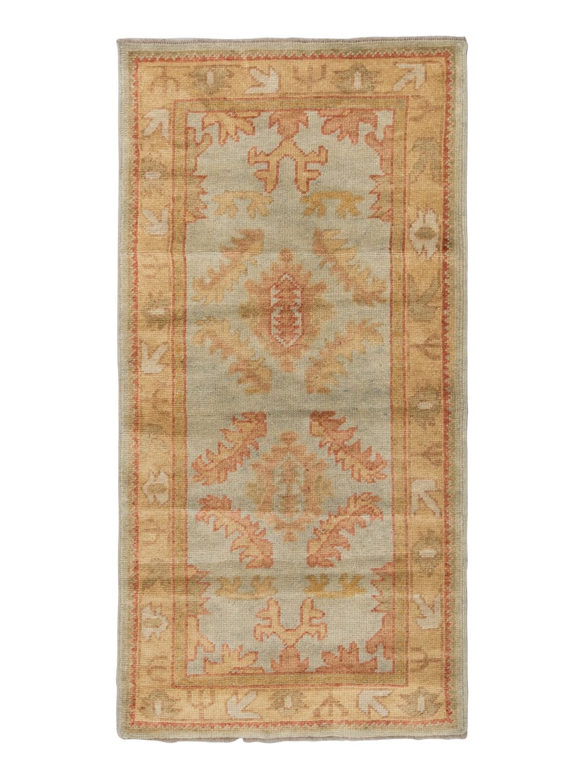 An Oushak Rug: An Oushak Rug 6 feet 2 inches x 3 feet 1 inch. Property from a Private Family Trust This lot is located in Chicago.