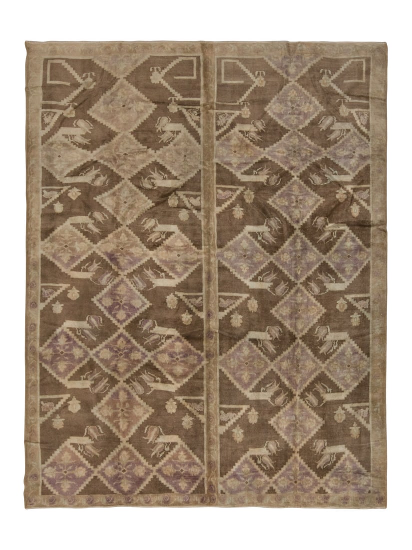 An Oushak Rug: An Oushak Rug 10 feet 5 inches x 9 feet 5 inches. Property from a Private Family Trust This lot is located in Chicago.