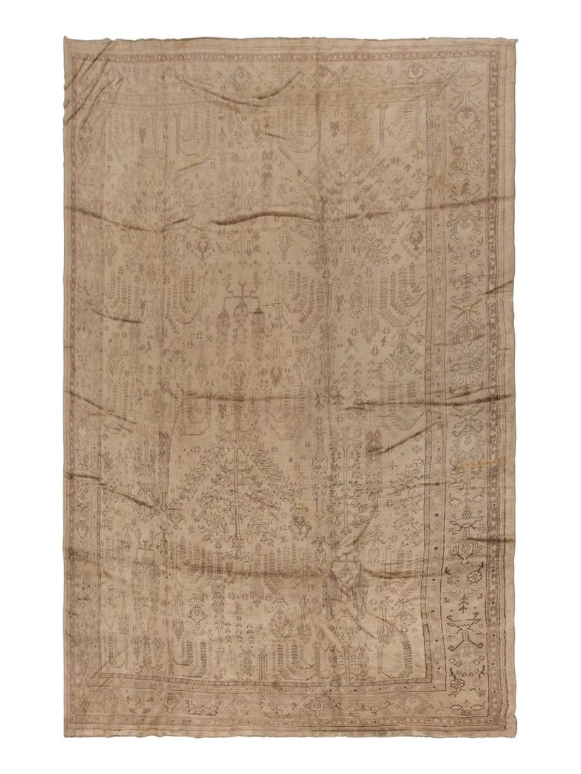 An Oushak Carpet: An Oushak Carpet Property from a Private Family Trust This lot is located in Chicago.