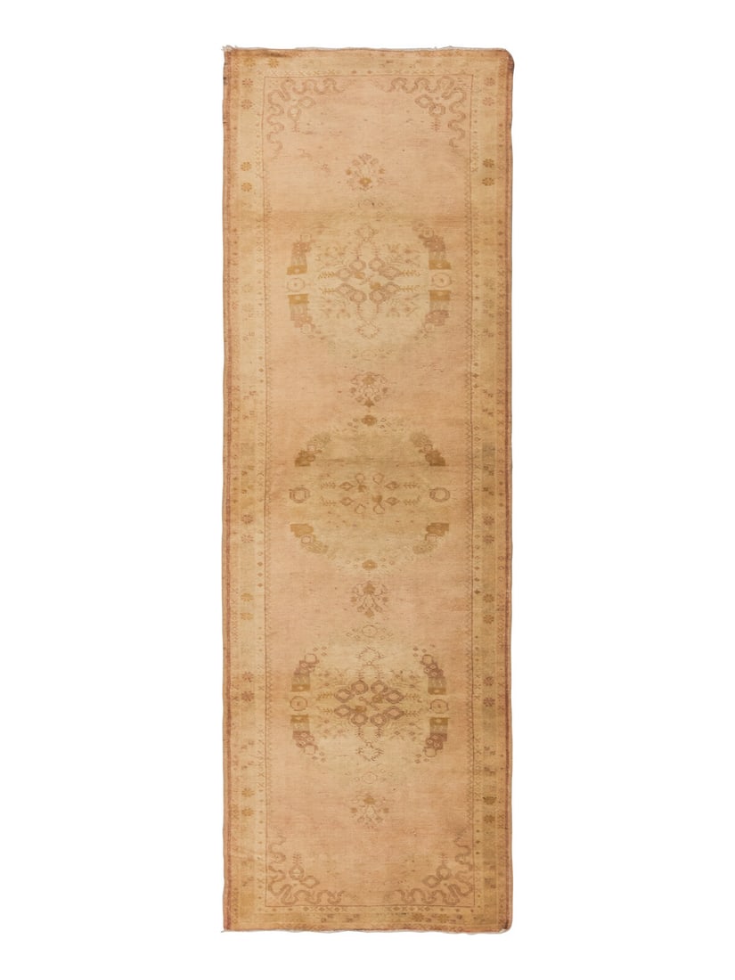 An Oushak Runner: An Oushak Runner 12 feet x 3 feet 2 inches. Property from a Private Family Trust This lot is located in Chicago.