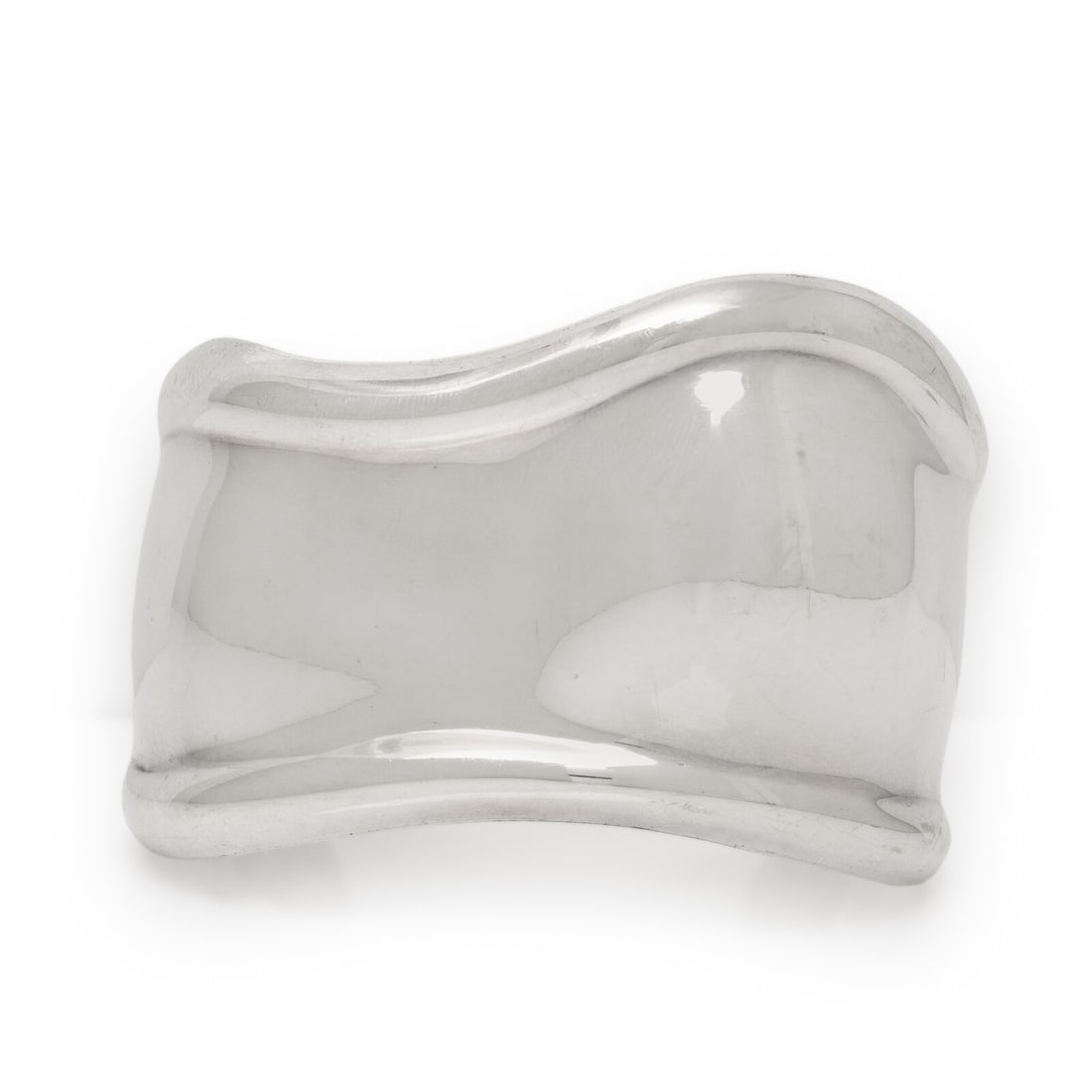 Tiffany & Co., Elsa Peretti, 'Bone Cuff', Sterling Silver Bracelet: Tiffany & Co., Elsa Peretti, 'Bone Cuff', Sterling Silver Bracelet Sterling silver. 6 inches inner circumference, 43 mm wide. Stamp: TIFFANY & CO. (Elsa Peretti maker's mark) 925 ITALY. Gross weight: 