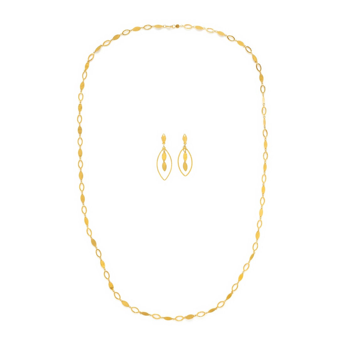 Gurhan, Yellow Gold Necklace and Earrings: Gurhan, Yellow Gold Necklace and Earrings Hammered yellow gold. Necklace: 40 inches long. Earrings: 2 3/16 inches long. Stamp: (Gurhan maker's mark) GURHAN. Stamp: (Gurhan maker's mark) GURHAN. Gross 