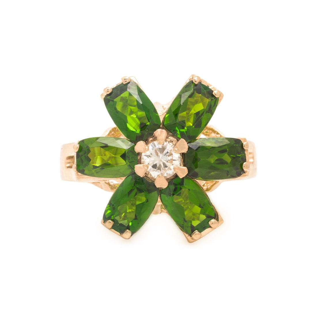 Chrome Diopside, Diamond, and Yellow Gold Flower Ring: Chrome Diopside, Diamond, and Yellow Gold Flower Ring Cushion cut chrome diopside and a round diamond. 14 karat yellow gold. Ring size 6. Stamp: 14K. Gross weight: 4.50 dwt. This lot is located in Chi