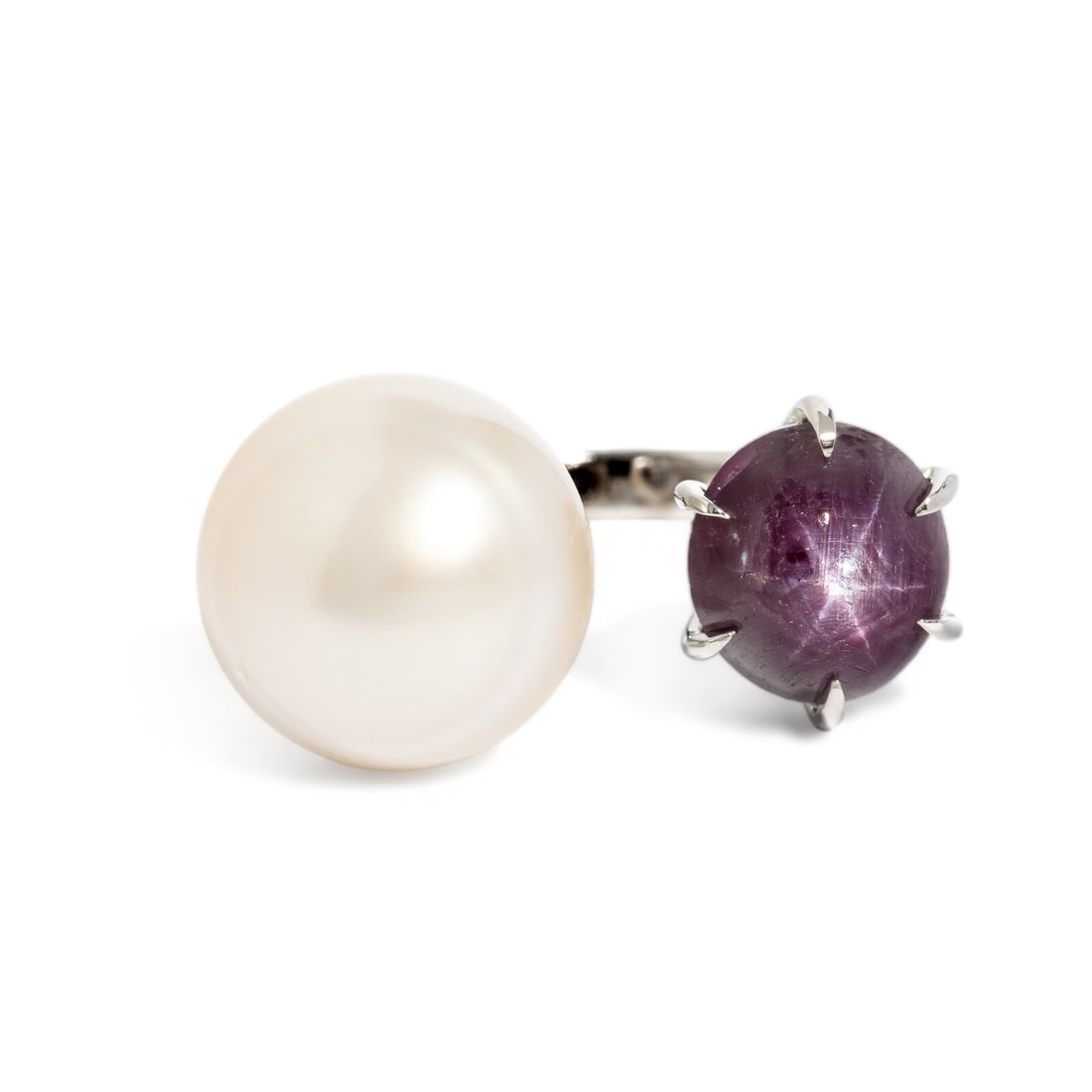 Star Ruby and Cultured Pearl Ring: Star Ruby and Cultured Pearl Ring Cultured pearl and oval double cabochon star ruby weighing 5.01 carats. 14 karat white gold. Ring size 5 3/4. Stamp: 14K. Gross weight: 4.75 dwt. GIA, 2024, Report No