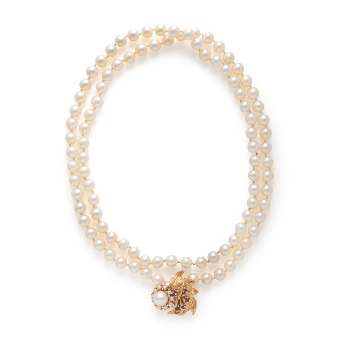 Cultured Pearl, Ruby, and Yellow Gold Necklace: Cultured Pearl, Ruby, and Yellow Gold Necklace Two strands of cultured pearls measuring approximately 7.00 - 7.35 mm, and a fastener with seed pearls, round rubies, and a cultured pearl. 14 karat yell