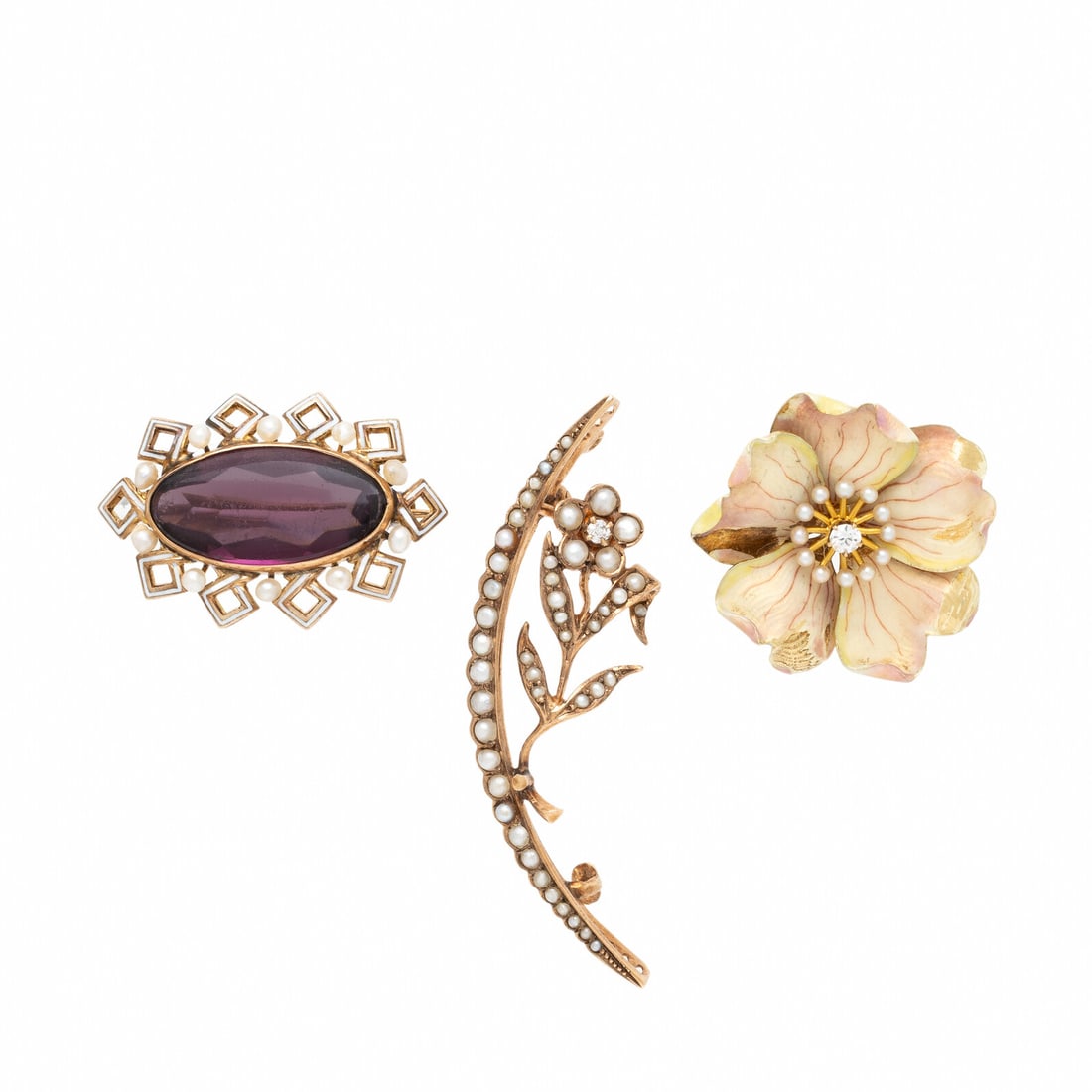 Three Seed Pearl Brooches: Three Seed Pearl Brooches One brooch set with an oval buff-top glass measuring approximately 20.85 x 10.45 x 6.35 mm, white enamel, and seed pearls, one brooch designed as a flower and set with polych
