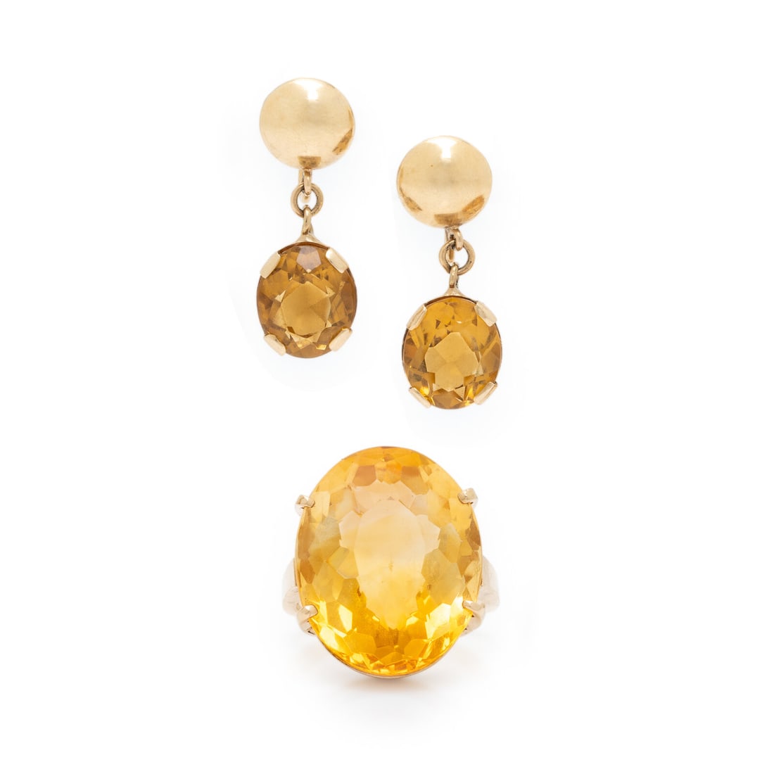 Yellow Gold and Citrine Ring and Earrings: Yellow Gold and Citrine Ring and Earrings The ring set with an oval citrine weighing approximately 27.00 carats by formula, and the earrings set with oval citrines weighing approximately 7.00 carats