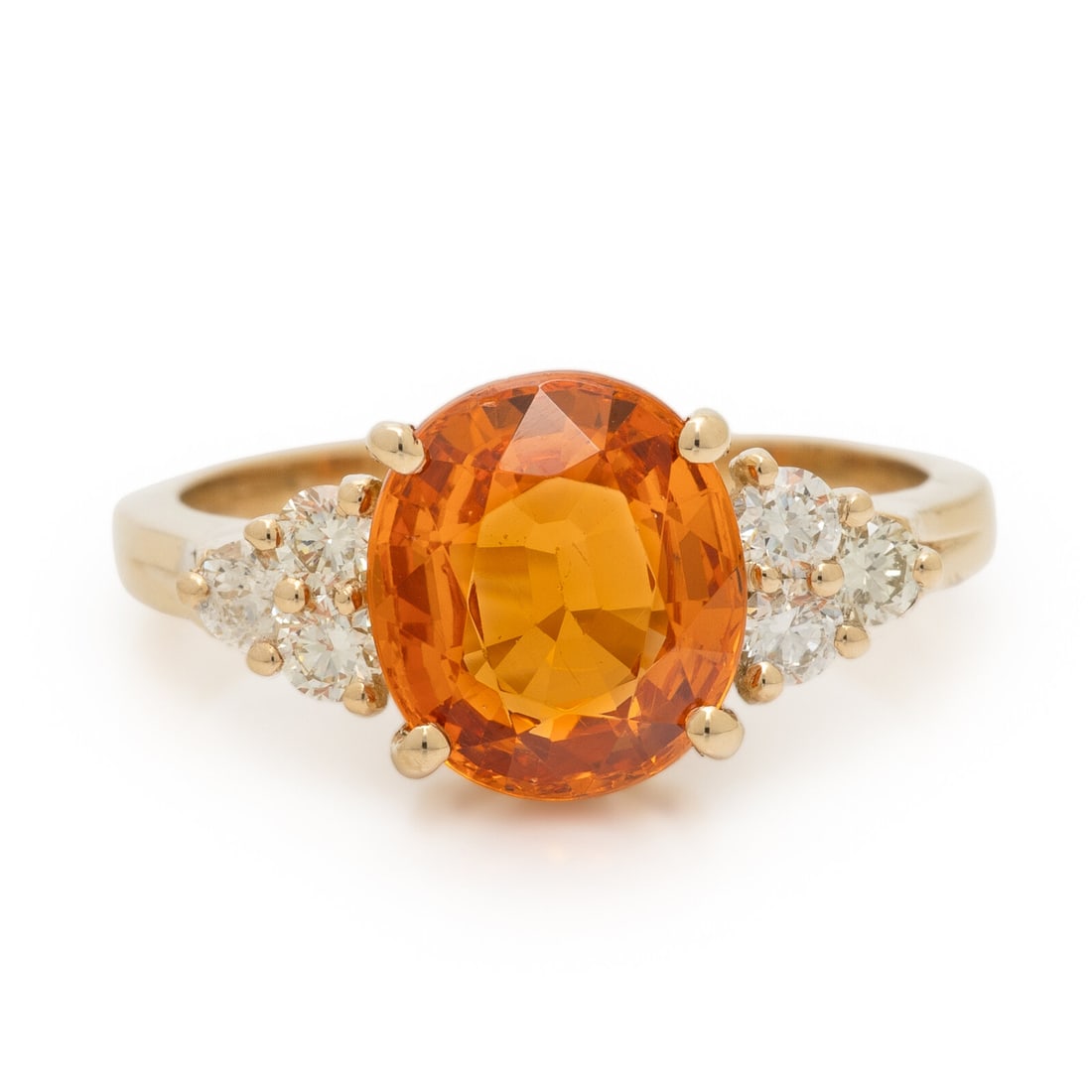 Spessartine Garnet, Diamond, and Yellow Gold Ring: Spessartine Garnet, Diamond, and Yellow Gold Ring Oval spessartine garnet weighing approximately 2.55 carats by formula, and round brilliant cut diamonds weighing approximately 0.25 carat total. 14