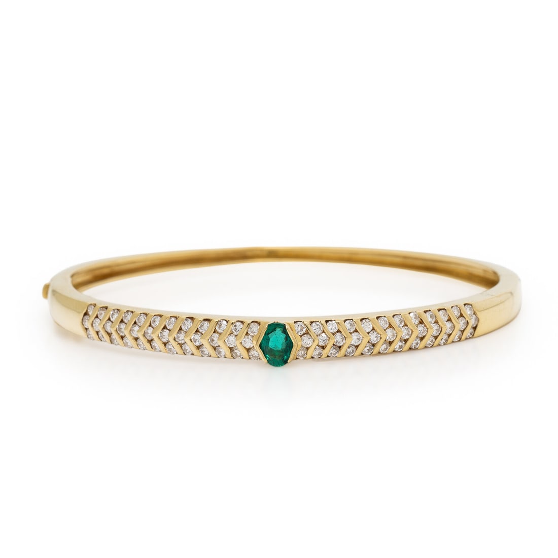 Damiani, Synthetic Emerald, Diamond, and Yellow Gold Bangle Bracelet: Damiani, Synthetic Emerald, Diamond, and Yellow Gold Bangle Bracelet Oval synthetic emerald, and round diamonds weighing approximately 1.40 carats total, hinged with a side clasp. 18 karat yellow gold