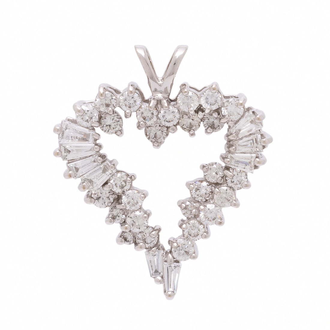 Diamond and White Gold Heart Pendant: Diamond and White Gold Heart Pendant Tapered baguette and round brilliant cut diamonds weighing approximately 1.65 carats total. 14 karat white gold. 1 x 7/8 inch. Stamp: 14K. Gross weight: 3.65 dwt.
