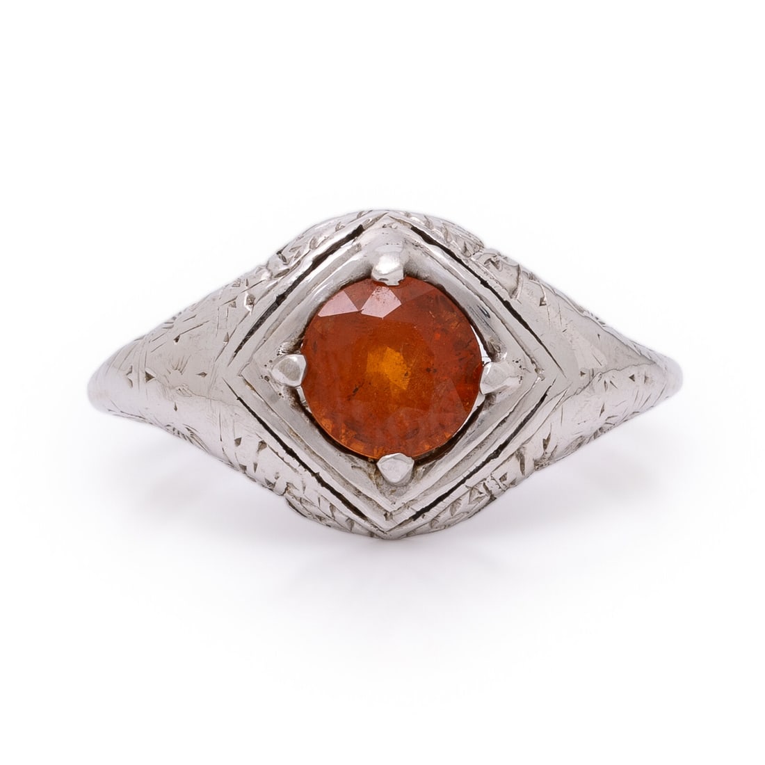 Spessartine Garnet and White Gold Ring: Spessartine Garnet and White Gold Ring Round spessartine garnet weighing approximately 1.55 carats by formula. White gold. Ring size 6 1/4. Gross weight: 2.10 dwt. From the Private Collection of Lady