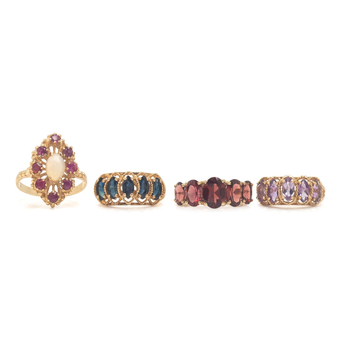 Collection of Four Gemstone Rings: Collection of Four Gemstone Rings One ring set with an oval opal and round rubies, one set with marquise cut sapphires, one set with oval garnets, and one set with marquise cut amethysts. 14 karat