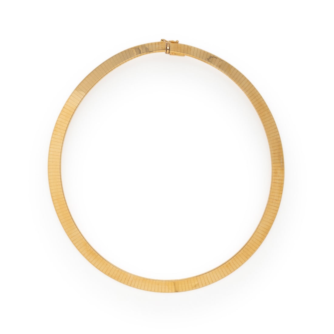 Yellow Gold Omega Necklace: Yellow Gold Omega Necklace 18 karat yellow gold. 15 inches inner circumference. Stamp: 18Kt ITALY (maker's mark). Gross weight: 35.35 dwt. Property from an Important Private Collection, Florida This l