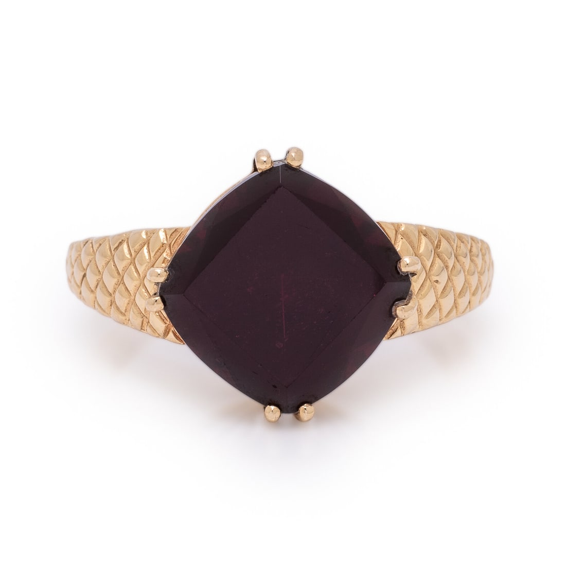Garnet and Yellow Gold Ring: Garnet and Yellow Gold Ring Modified cushion cut garnet measuring approximately 11.85 x 11.70 x 8.00 mm. Yellow gold. Ring size 9. Gross weight: 3.65 dwt. From the Private Collection of Lady