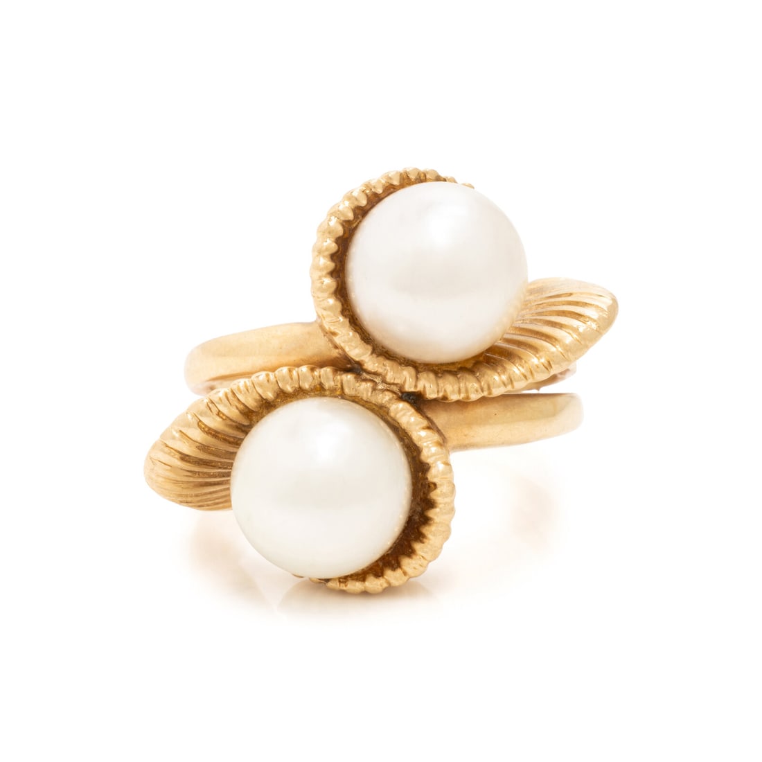 Yellow Gold and Cultured Pearl Bypass Ring: Yellow Gold and Cultured Pearl Bypass Ring Cultured pearls measuring approximately 7.50 mm. 14 karat yellow gold. Ring size 4. Stamp: C 14K. Gross weight: 5.15 dwt. This lot is located in Chicago.