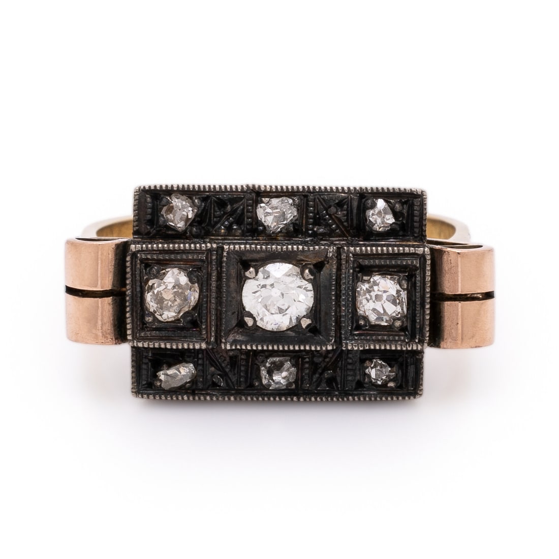 Diamond and Silver-Topped Gold Ring: Diamond and Silver-Topped Gold Ring Single and old European cut diamonds. Silver-topped gold and 14 karat yellow gold. Ring size 7 1/4. Stamp: 585 KT. Gross weight: 3.70 dwt. From the Estate of a Penn
