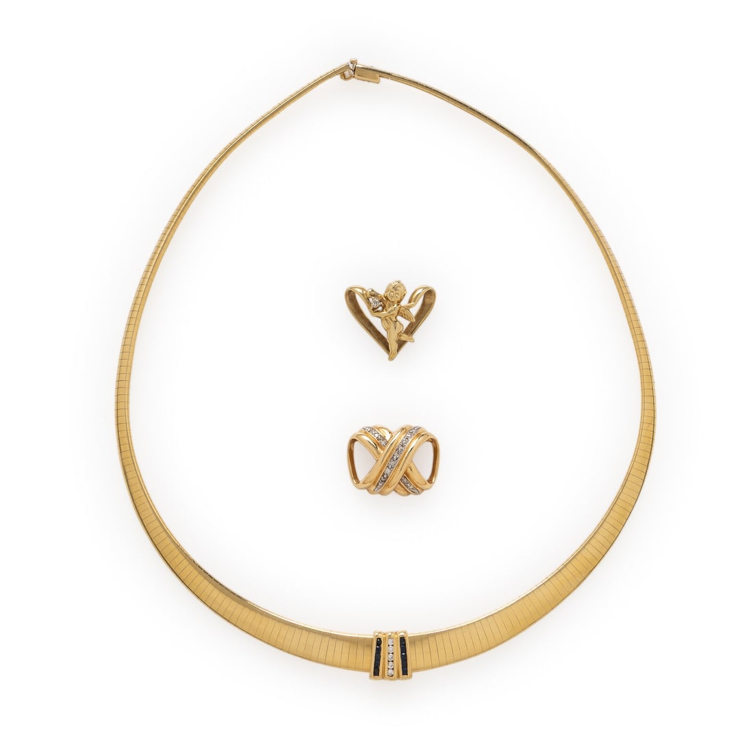 Yellow Gold Omega Necklace with Three Slide Pendants: Yellow Gold Omega Necklace with Three Slide Pendants One slide set with round brilliant cut diamonds, one set with round brilliant cut diamonds and round sapphires, and one set with a single cut diamo