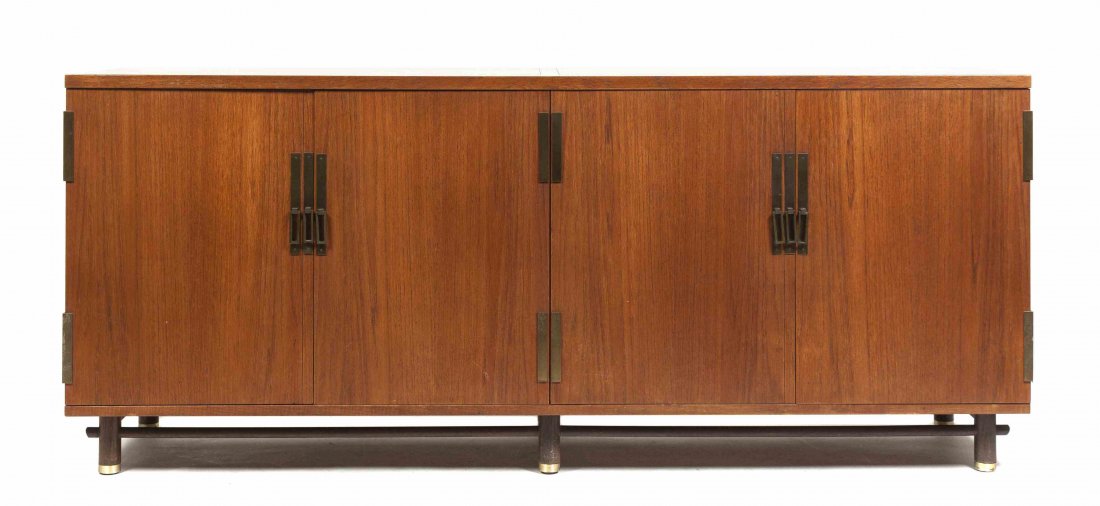 A Sideboard, Early Baker, Height 32 x width 76 x depth: A Sideboard, Early Baker, the rectangular top over two sets of doors, raised on circular legs joined by stretchers. Height 32 x width 76 x depth 19 inches. Property from the Collection of Richard K. F