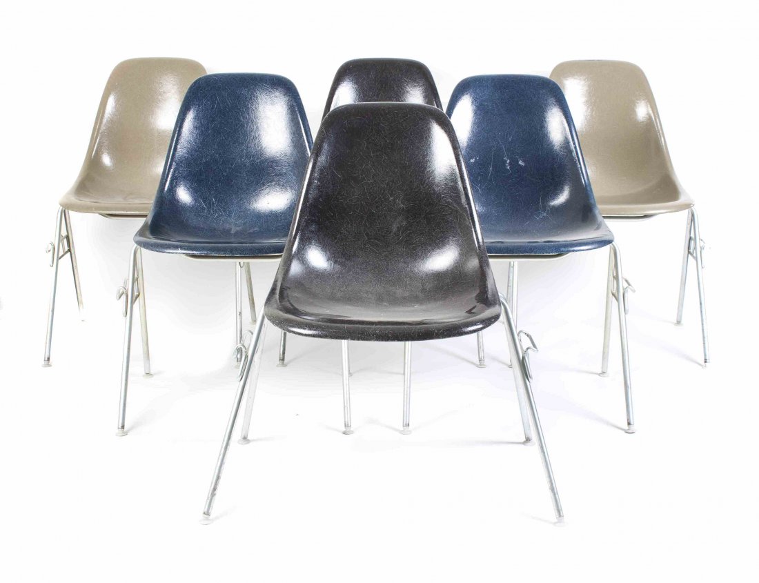 Three Pairs of Charles and Ray Eames Chairs Height of: Three Pairs of Charles and Ray Eames Chairs comprising two blue, two black and two beige chairs, all raised on tubular legs. Height of tallest 31 1/2 inches. Property from the Collection of the Milwau