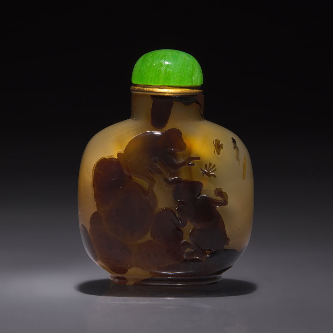 A Chinese Carved Shadow Agate "Monkeys and Wasps" Snuff Bottle, Qing Dynasty, Circa 1780-1850 (1 of 2)