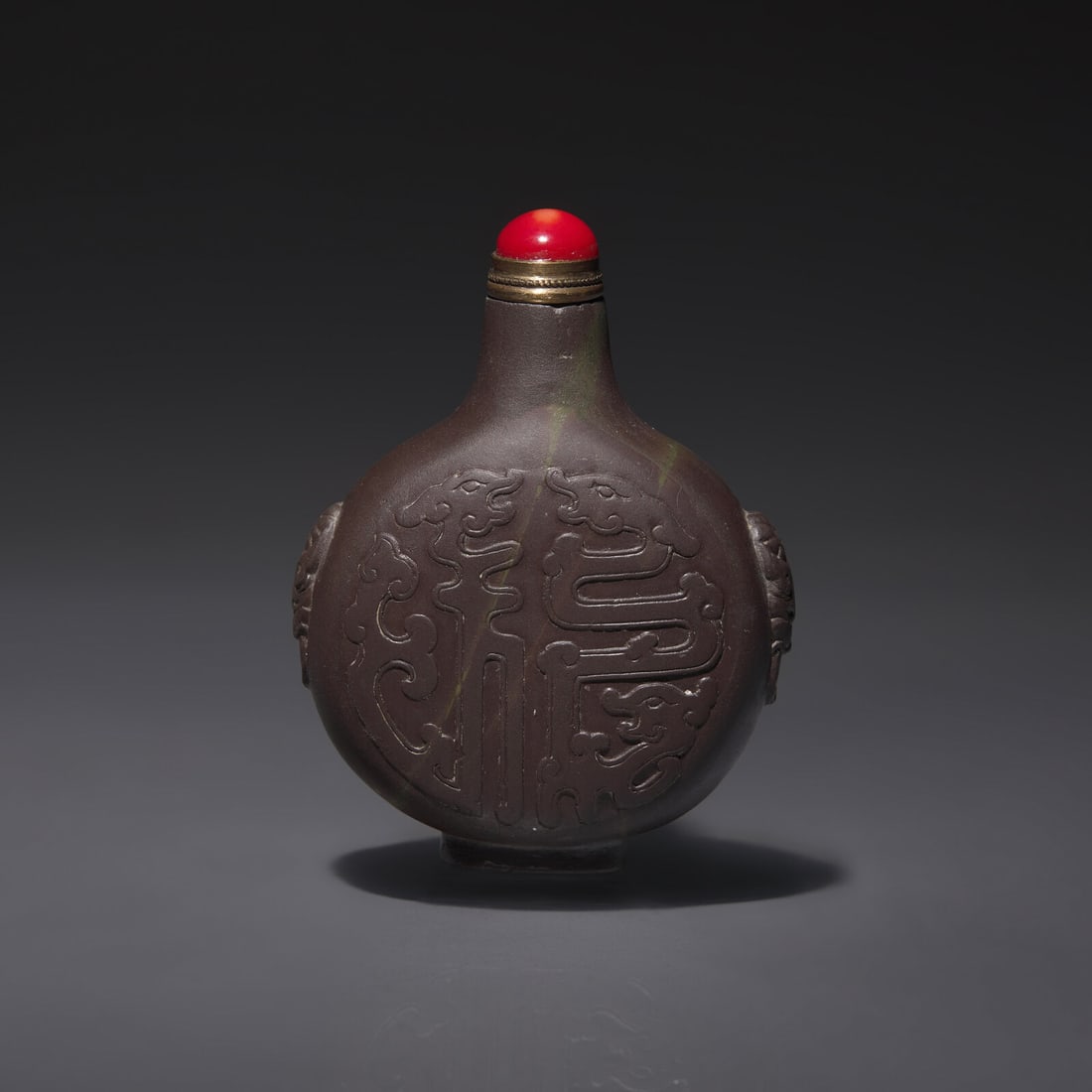 A Chinese Carved Duan Stone Snuff Bottle, Qing Dynasty, Circa 1800-1850 (1 of 2)