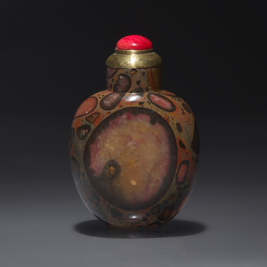 A Chinese Puddingstone Snuff Bottle, Qing Dynasty, Circa 1750-1850: A Chinese Puddingstone Snuff Bottle, Qing Dynasty, Circa 1750-1850 1750–1860年 抱子石鼻煙壺 Circa 1750-1850 Of slightly flattened ovoid form, with a cyl