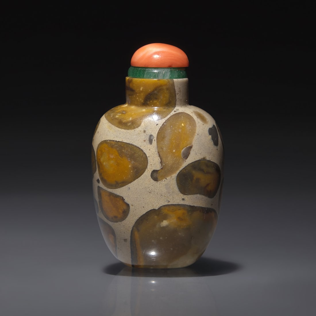 A Chinese Puddingstone Snuff Bottle, Qing Dynasty, Circa 1780-1850 (1 of 2)