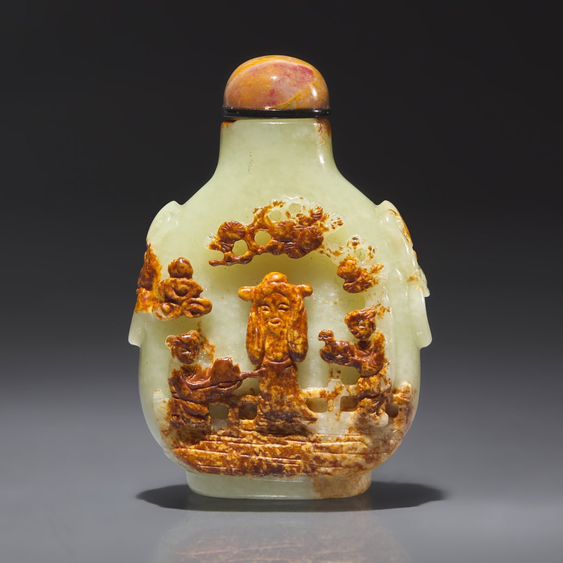 A Chinese Carved Jade Snuff Bottle, Qing Dynasty, Circa 1750-1850: A Chinese Carved Jade Snuff Bottle, Qing Dynasty, Circa 1750-1850 1750-1850年 黃玉留皮巧雕加官進爵圖鼻煙壺 Cir
