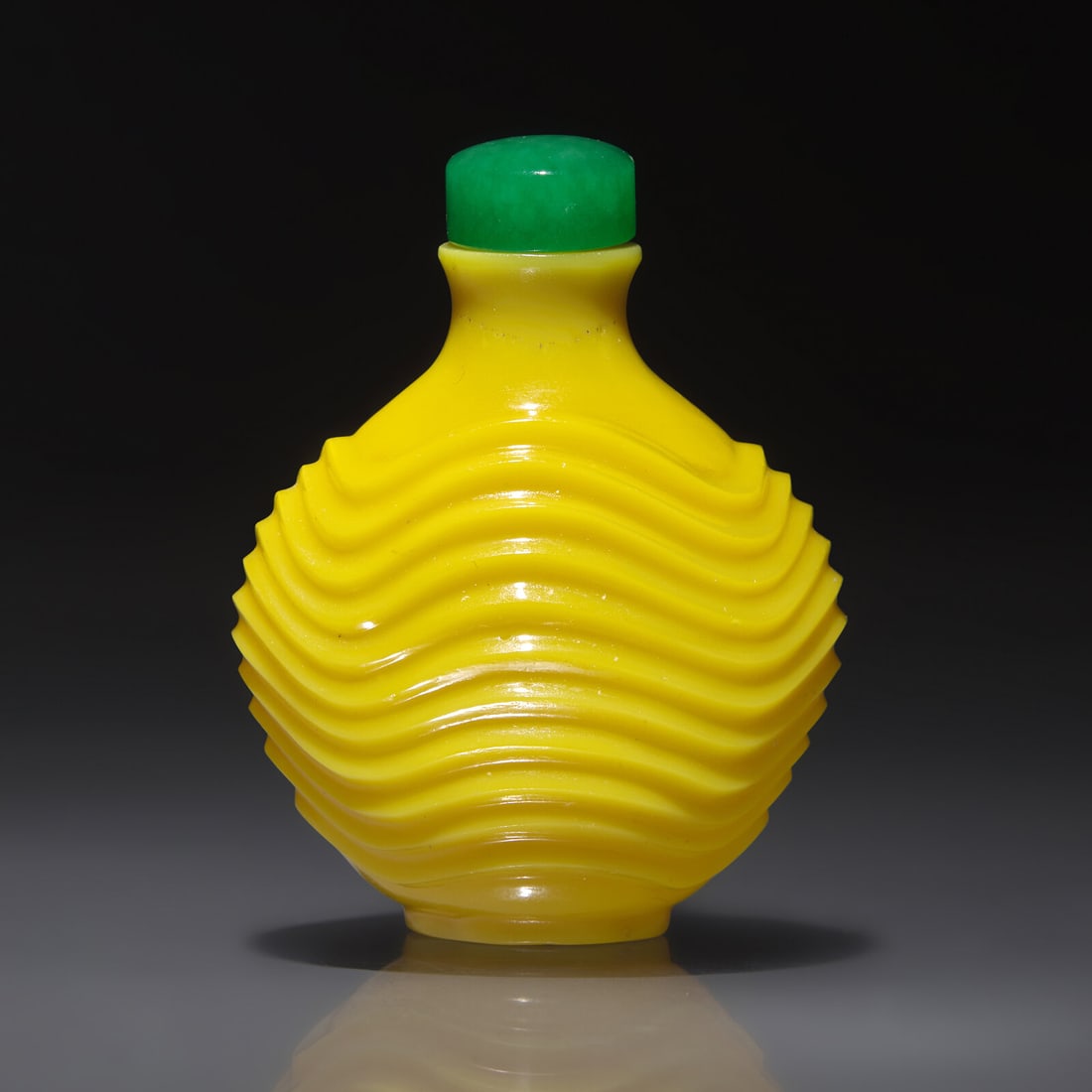 An Imperial Chinese Carved Yellow Glass Snuff Bottle, Qing Dynasty, Circa 1723-1795: An Imperial Chinese Carved Yellow Glass Snuff Bottle, Qing Dynasty, Circa 1723-1795 1723-1795年 御製鷄油黃料雕波紋鼻煙壺 C