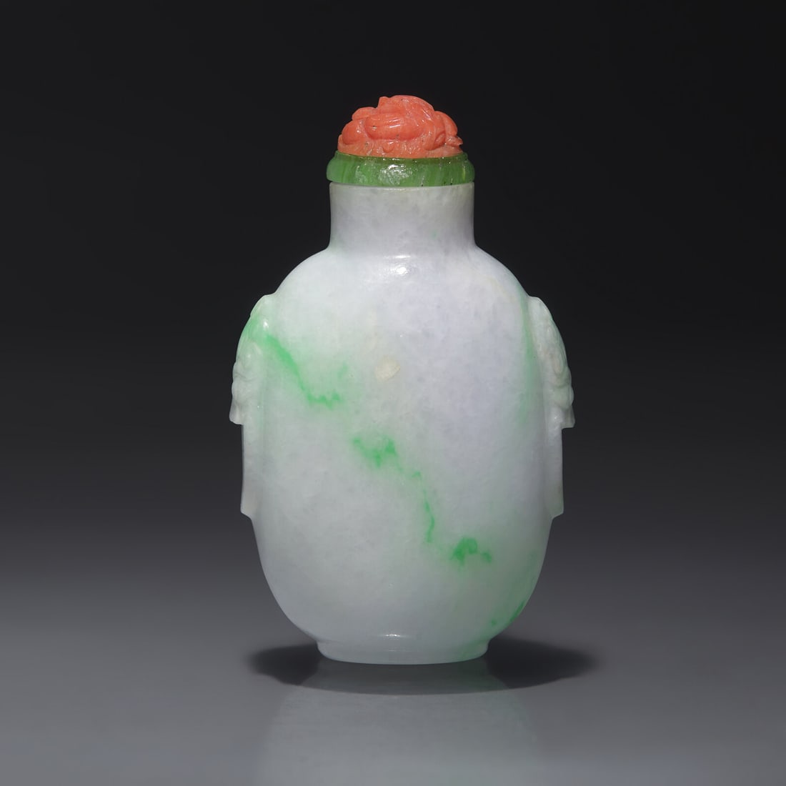 A Chinese Carved Jadeite Snuff Bottle, Qing Dynasty, 19th/Early 20th Century (1 of 2)