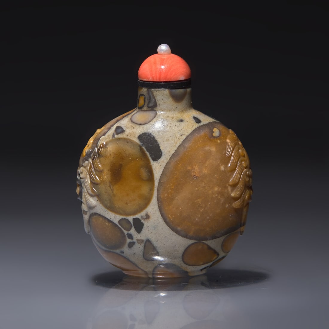 A Chinese Carved Puddingstone Snuff Bottle, Qing Dynasty, Circa 1750-1820 (1 of 3)