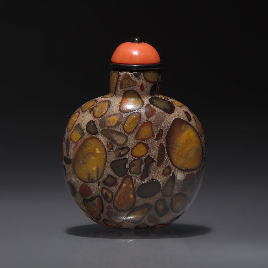A Chinese Puddingstone Snuff Bottle, Qing Dynasty, Circa 1740-1860 (1 of 2)