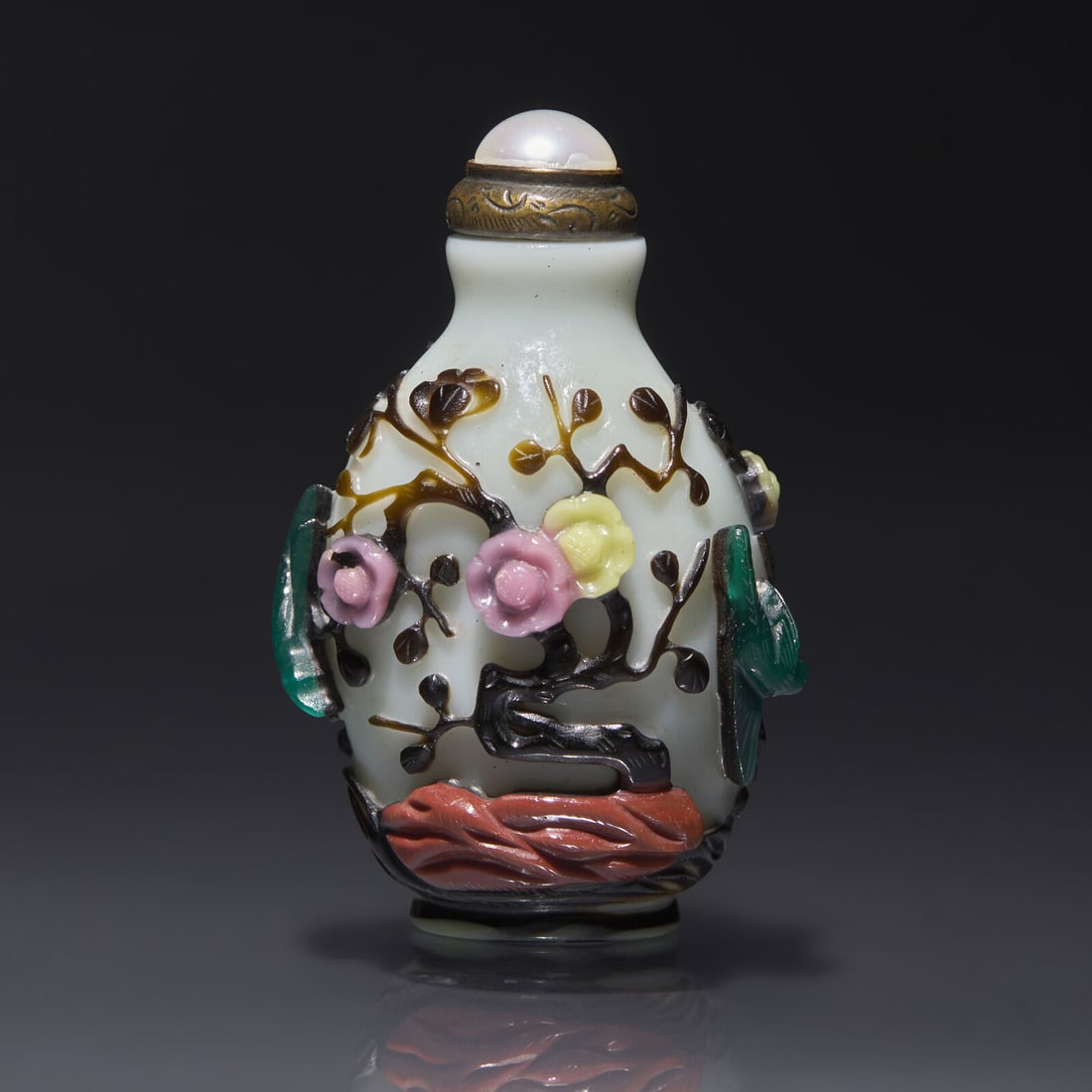 A Chinese Carved Five-Color Overlay Glass Snuff Bottle, Qing Dynasty, Circa 1736-1795 (1 of 2)